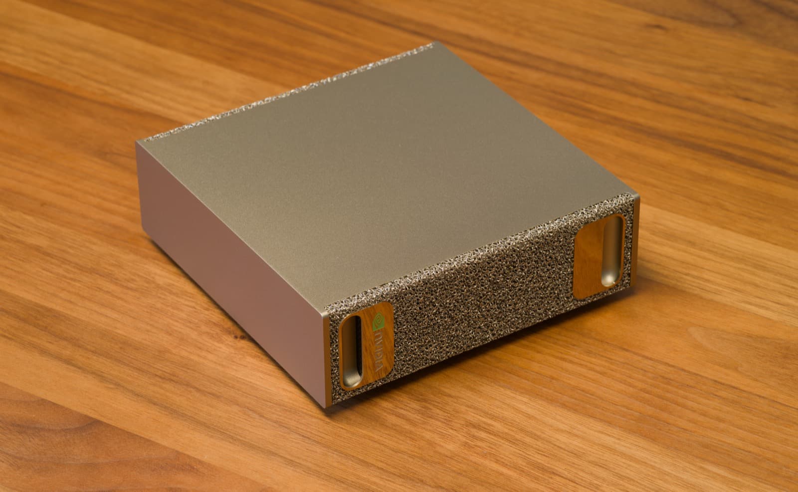 Oblique view of a compact NVIDIA DGX Spark desktop AI workstation.